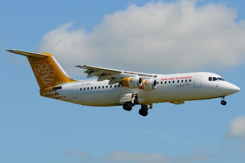Malmo-Aviation-BAe-RJ100-Reg-SE-DSS-landing-at-Manchester