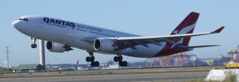 A QANTAS Airbus A330 climbs out from runway 34L at Sydney Airport.