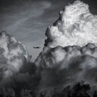  What causes turbulence? Thermal activity resulting in towering cumulonimbus clouds are areas of a high likelihood of turbulence. 